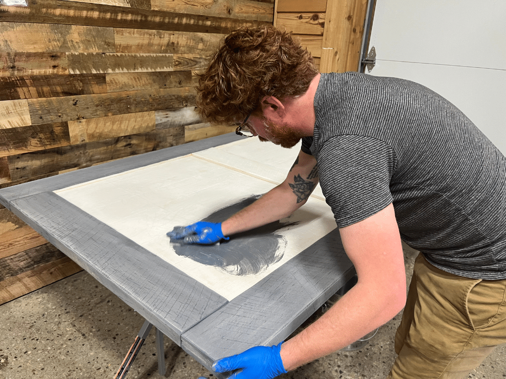 staining a reclaimed wood barn door