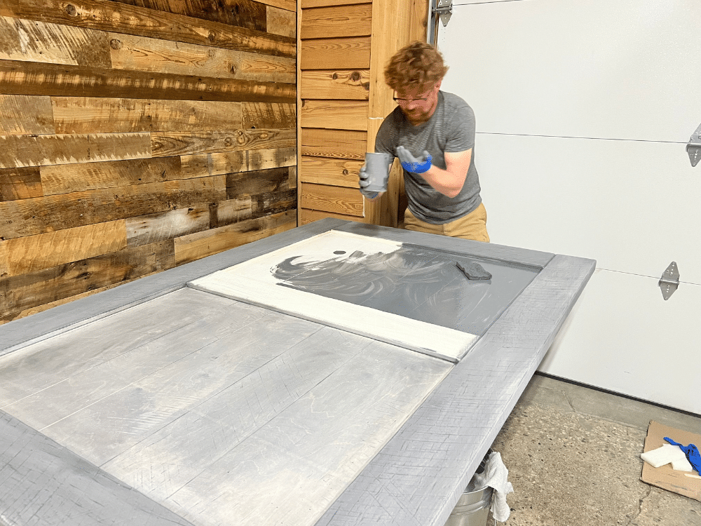 staining a reclaimed barn wood door: applying stain step 3